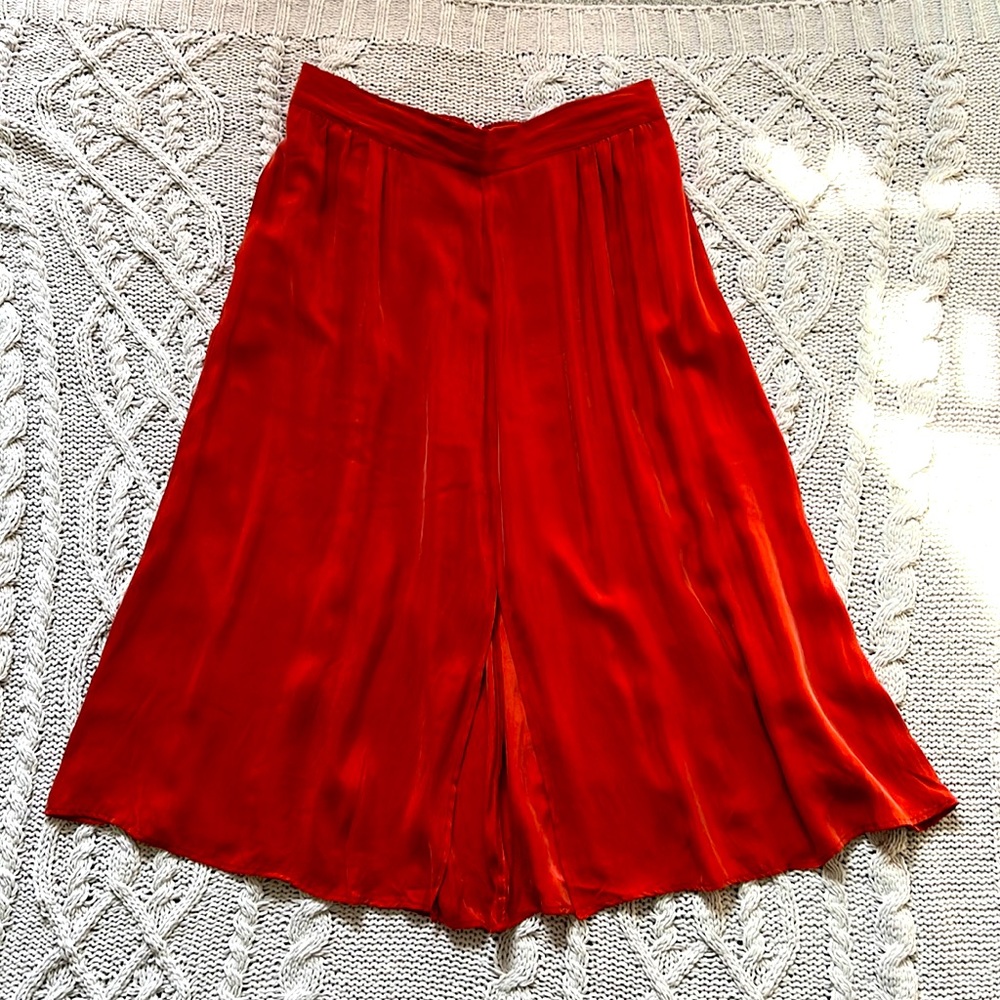 Rust color. Super flowy, soft skirt!